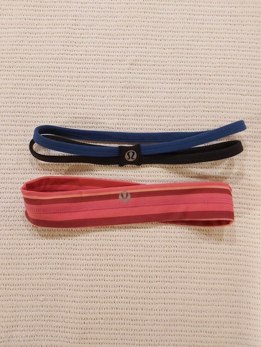 Pair of lululemon Pink and Blue Workout Heabands